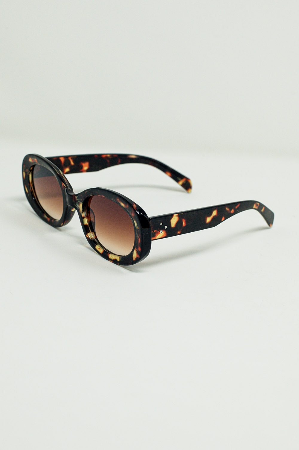 Lunettes de soleil de forme ovale en écaille de tortue