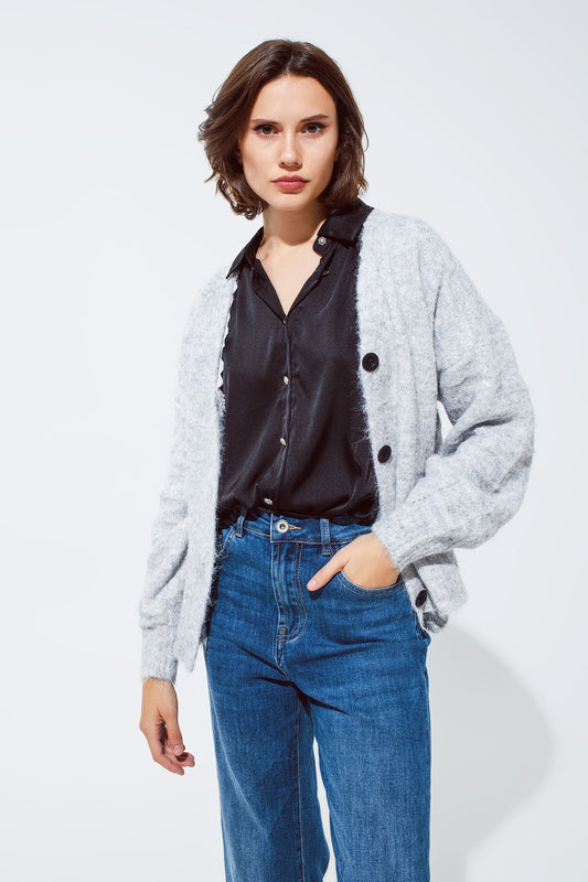 Cardigan gris à col en V profond avec détail en dentelle