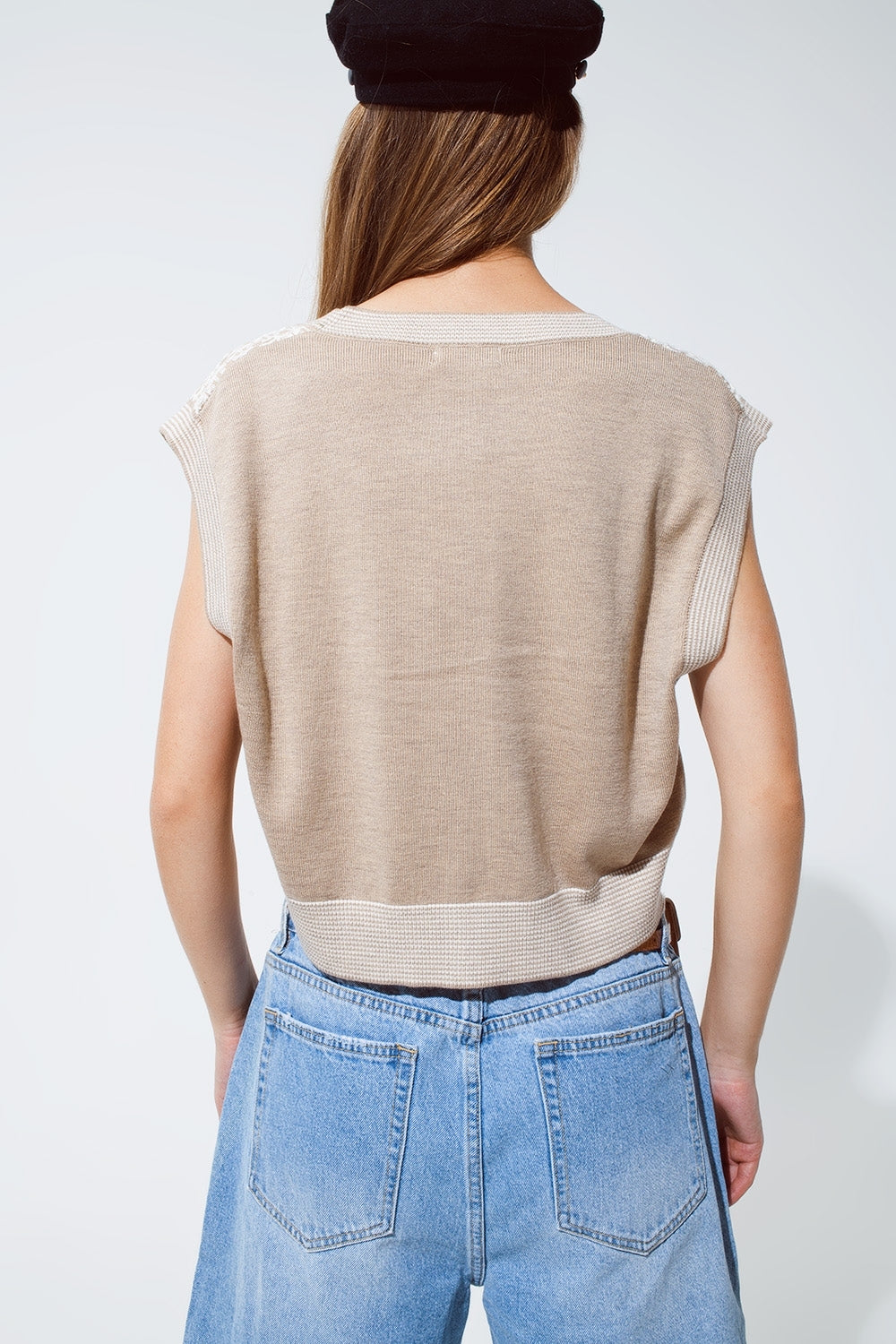 Gilet croisé en tricot avec bordures en côtes en beige