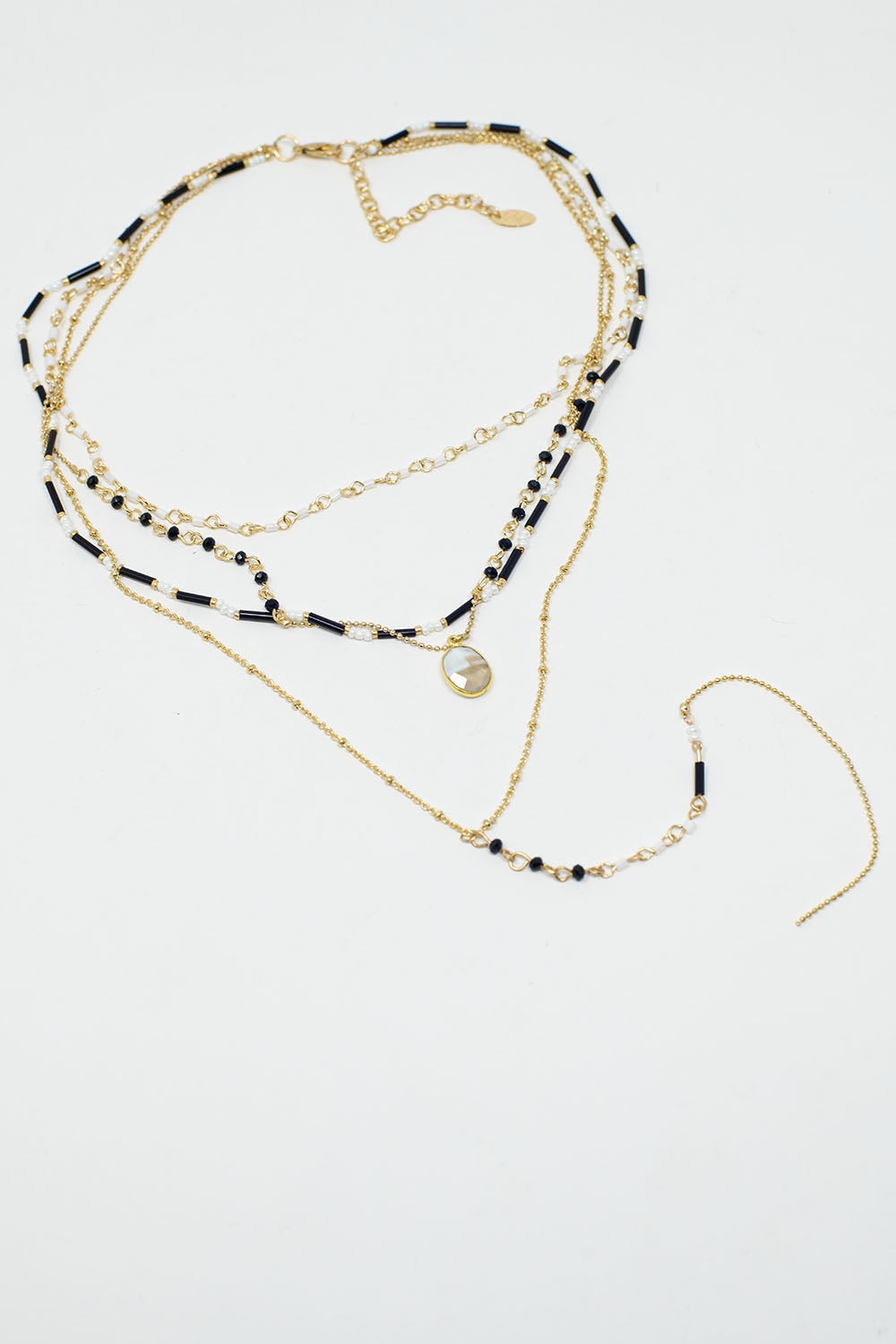 Collier 4 en 1 en or avec perles noires et blanches