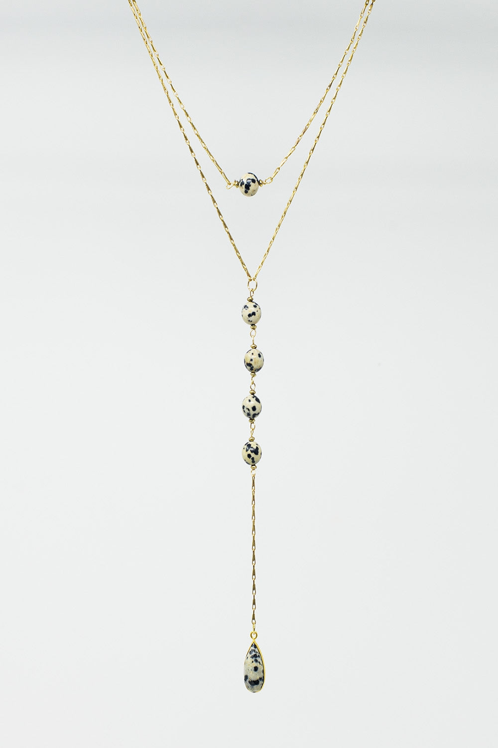 Collier 2 en 1 avec pierres marbrées noires et blanches