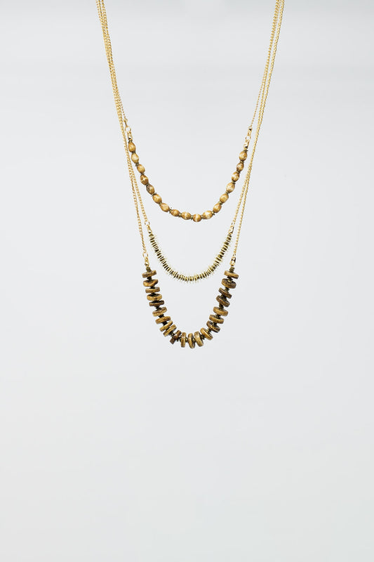 Collier 3 en 1 avec des perles dorées de différentes formes et tailles