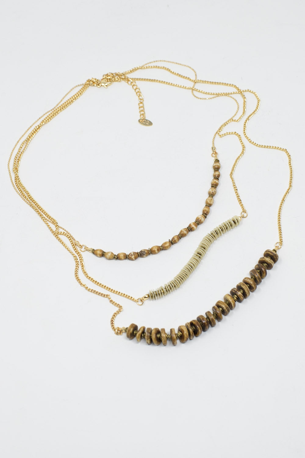 Collier 3 en 1 avec des perles dorées de différentes formes et tailles