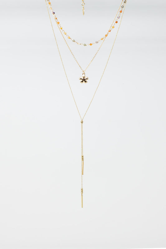 Collier 3 en 1 avec breloque étoile et perles multicolores.