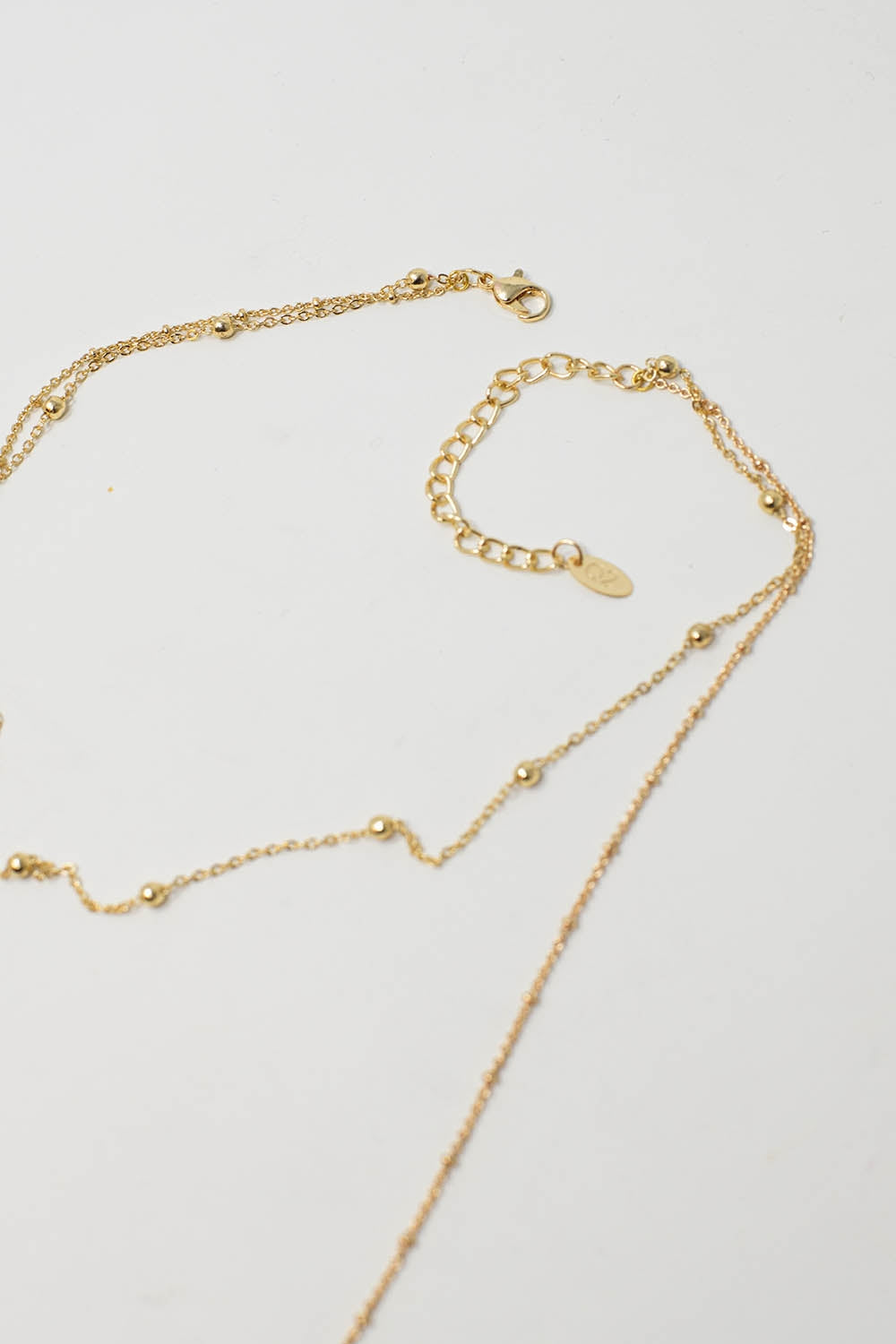 Collier 2 en 1 avec perles bleues et dorées