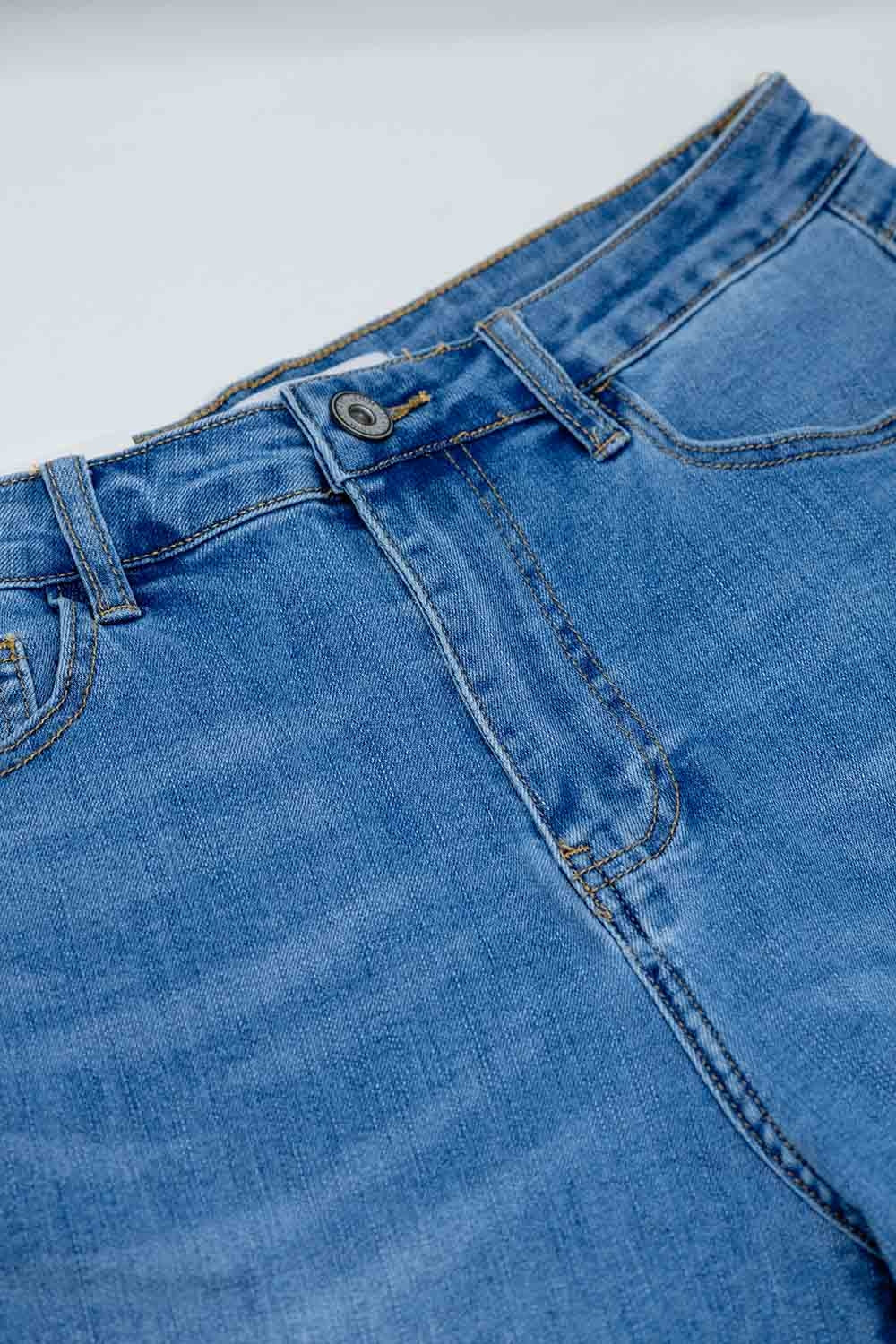 Jean taille haute en denim extensible moyennement délavé