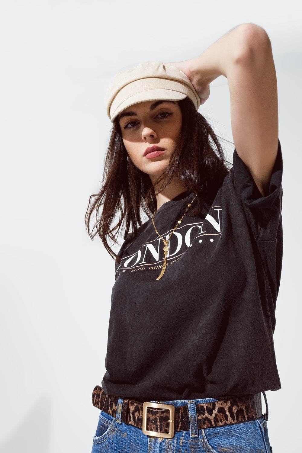 T-shirt à coupe décontractée en noir lavé avec logo londonien