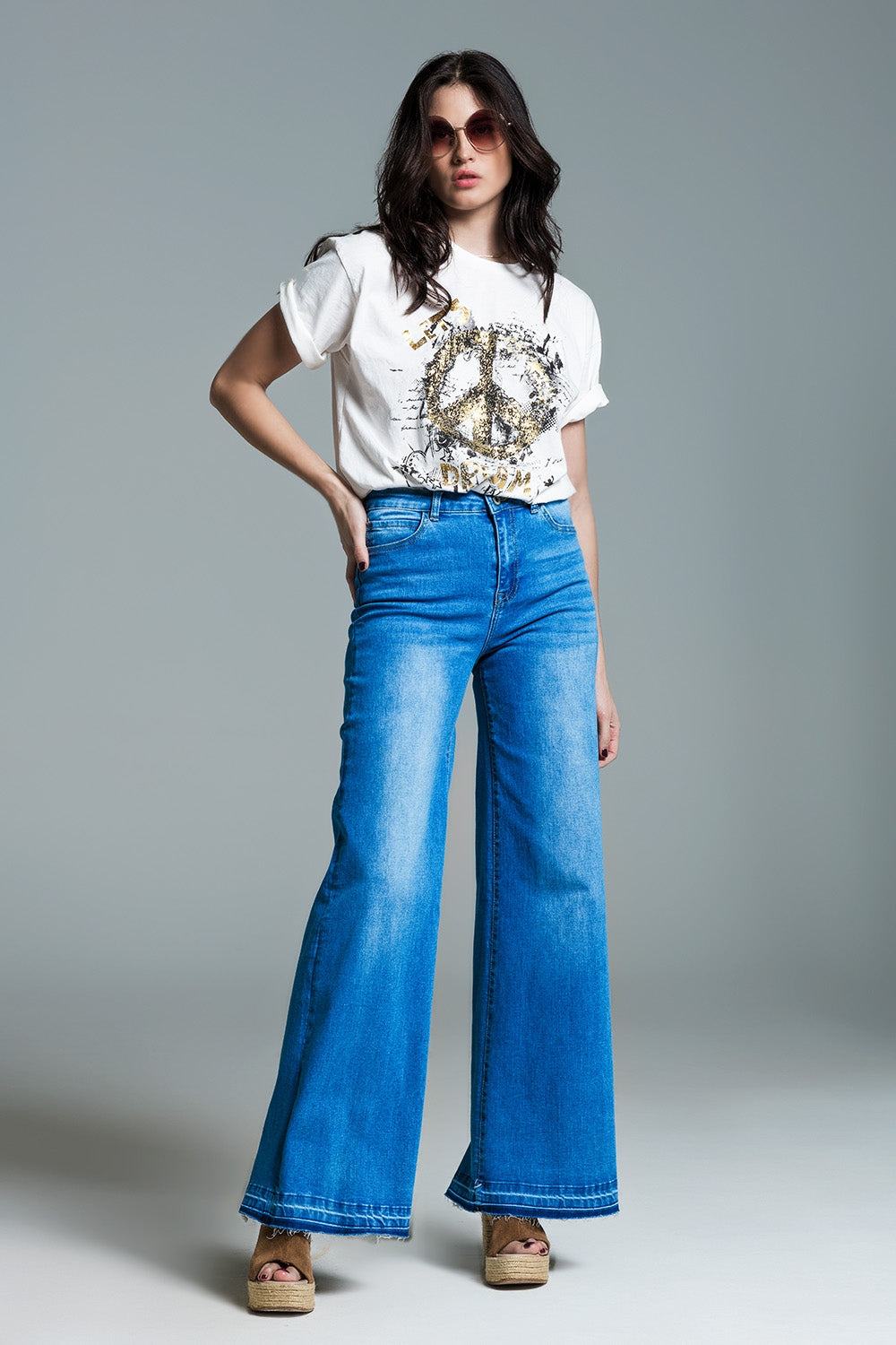Jeans style palazzo à délavage moyen avec double piqûre à l'ourlet