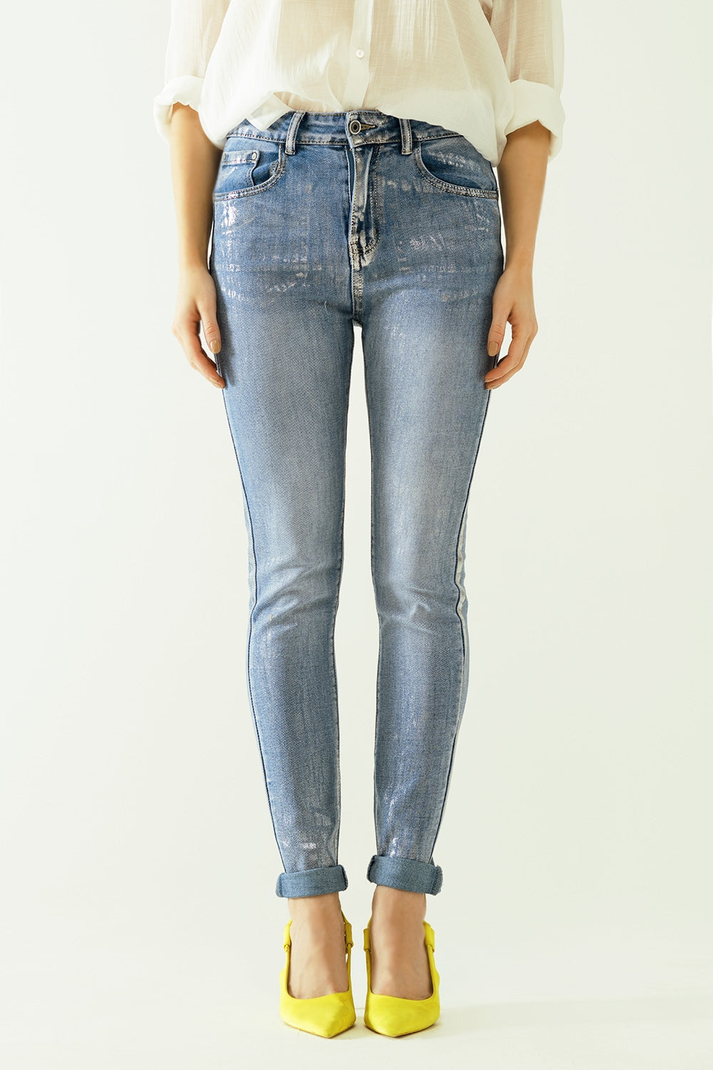Jean taille haute à cinq poches avec effet poudré argenté