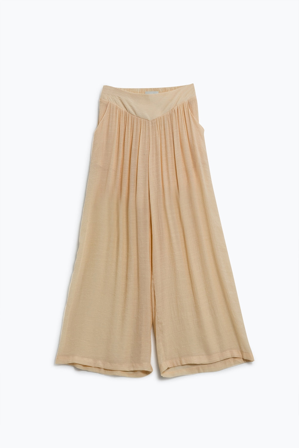 Pantalon de style palazzo beige avec poches latérales et bande de taille épaisse