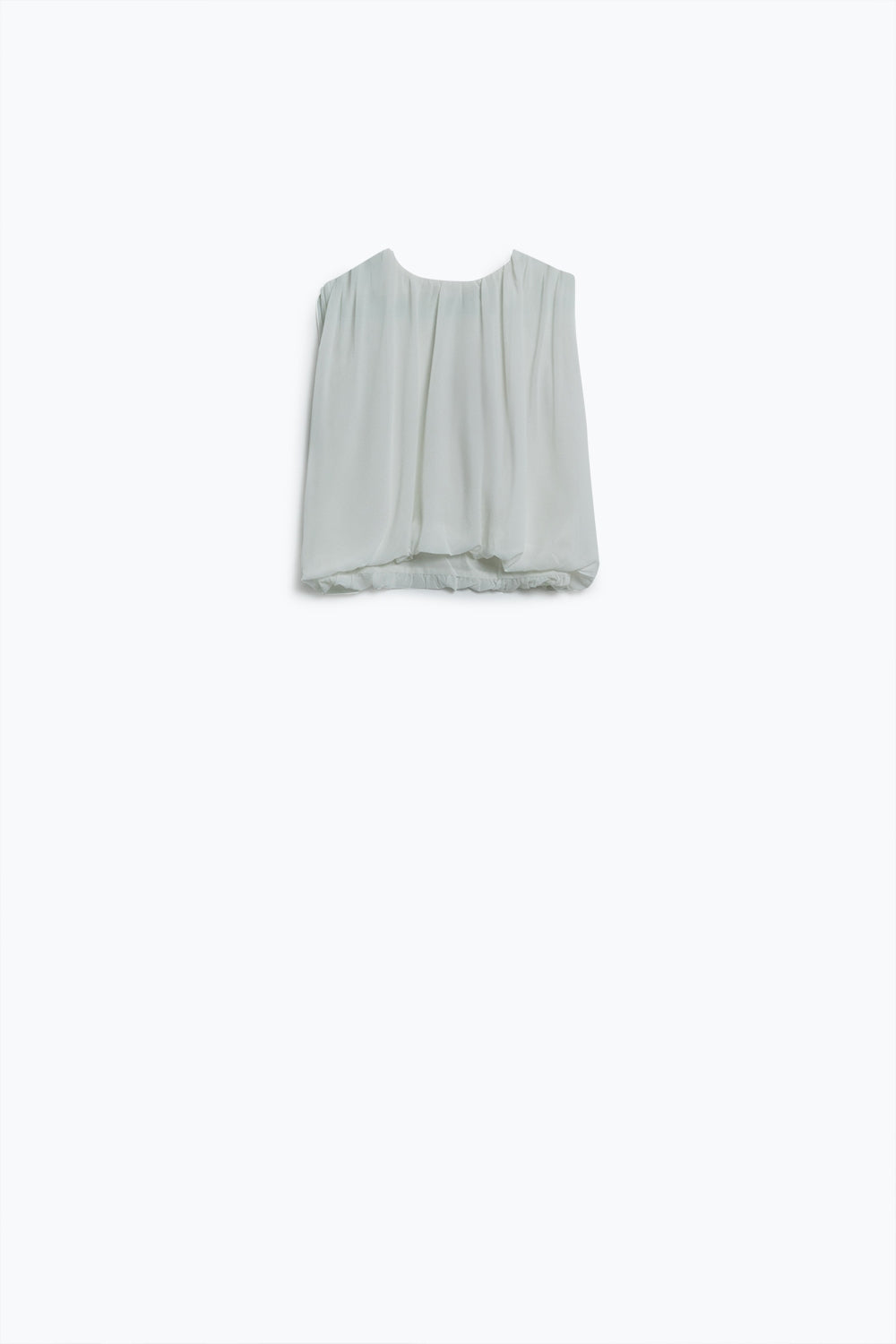 Top en mousseline de soie blanche avec motifs froncés