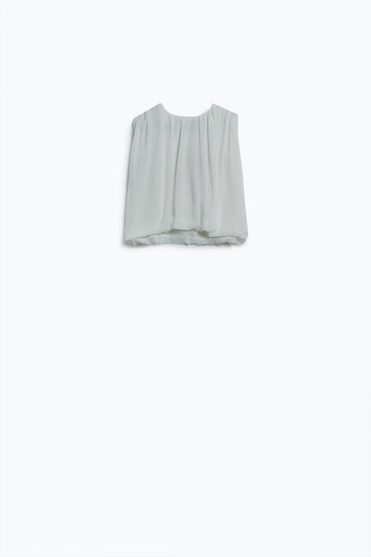 Top en mousseline de soie blanche avec motifs froncés