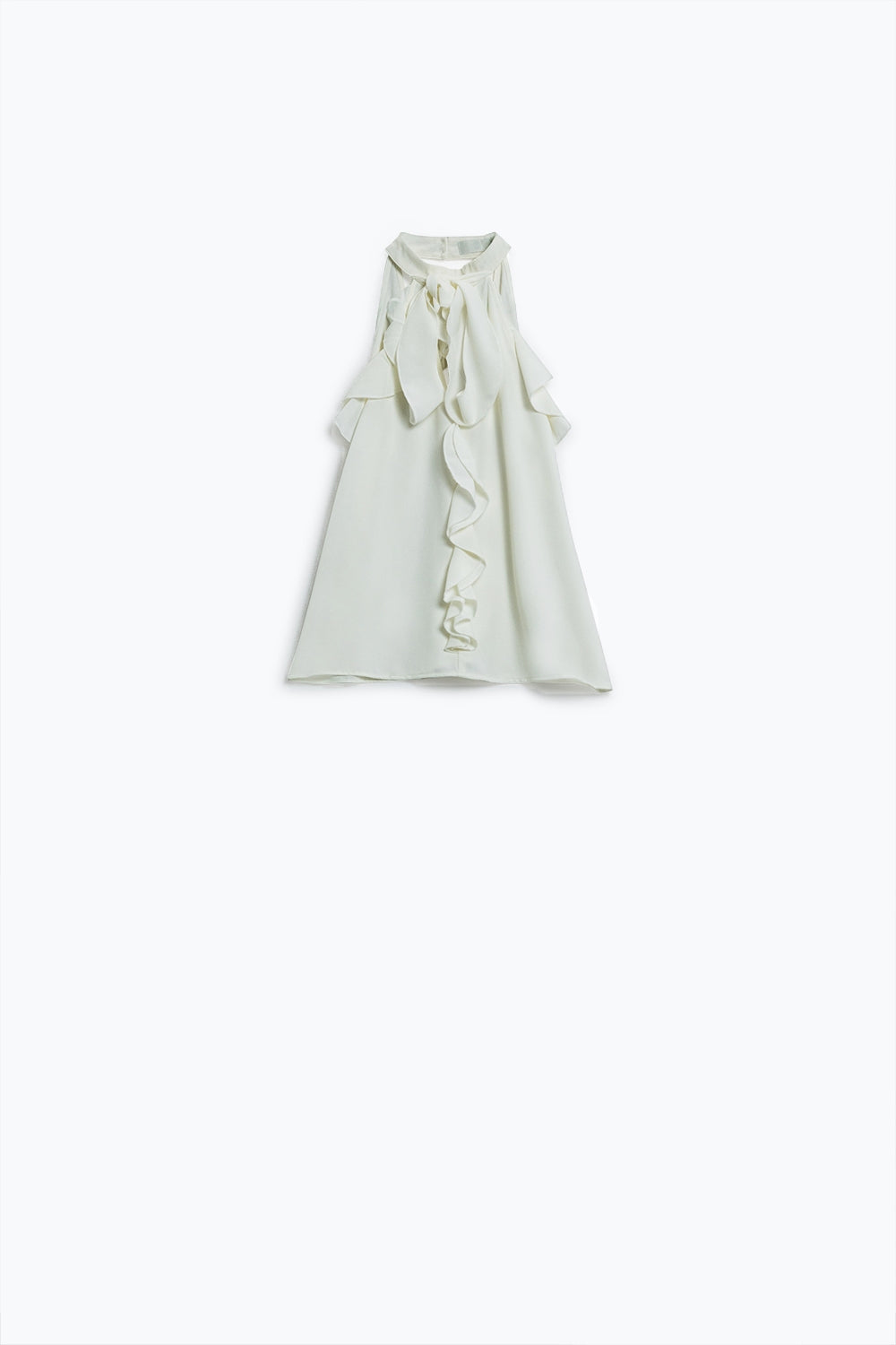 Top blanc sans manches avec détails à volants et col montant