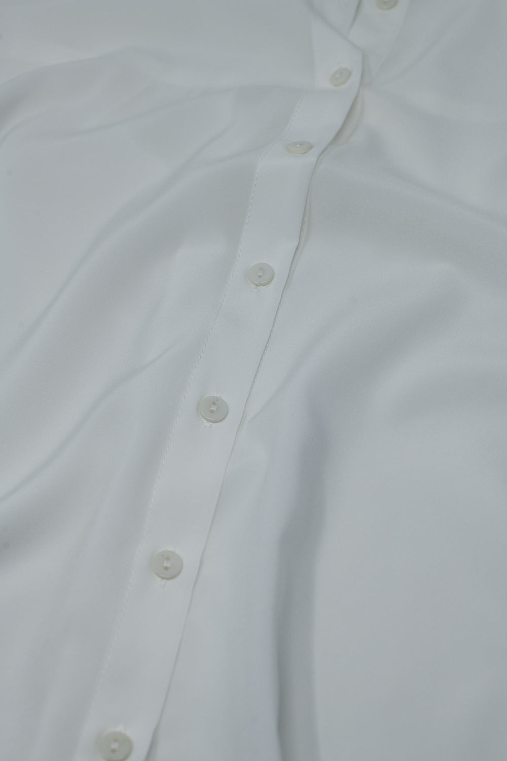 Chemisier boutonné sans manches blanc
