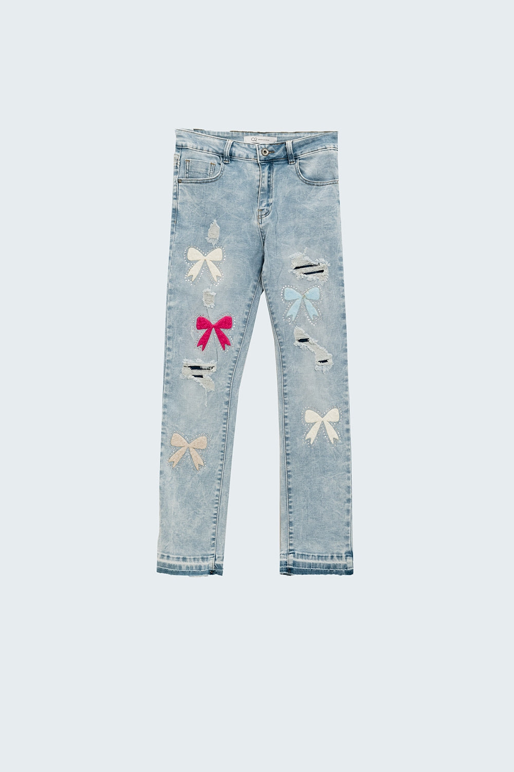 Jean super skinny bleu clair avec nœud papillon et trous déchirés
