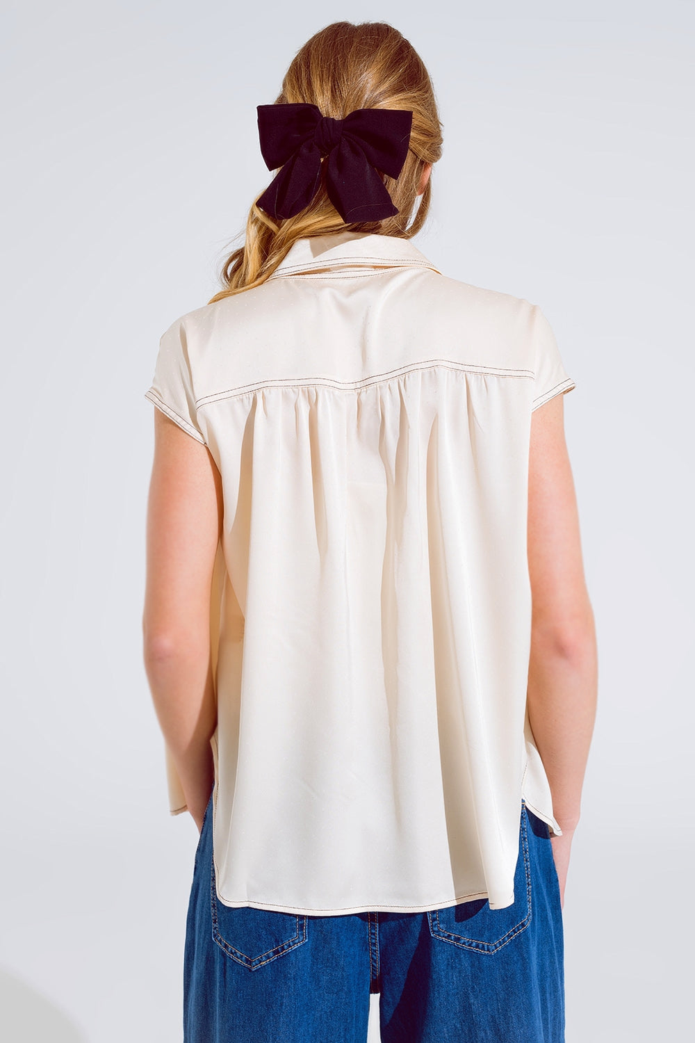 Chemisier sans manches à col polo en beige