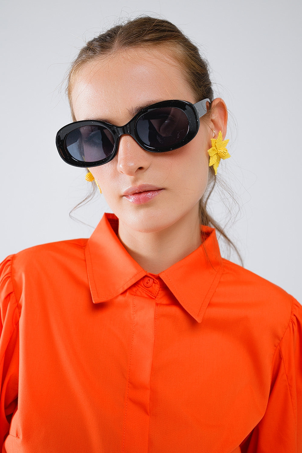 Lunettes de soleil ovales surdimensionnées en noir