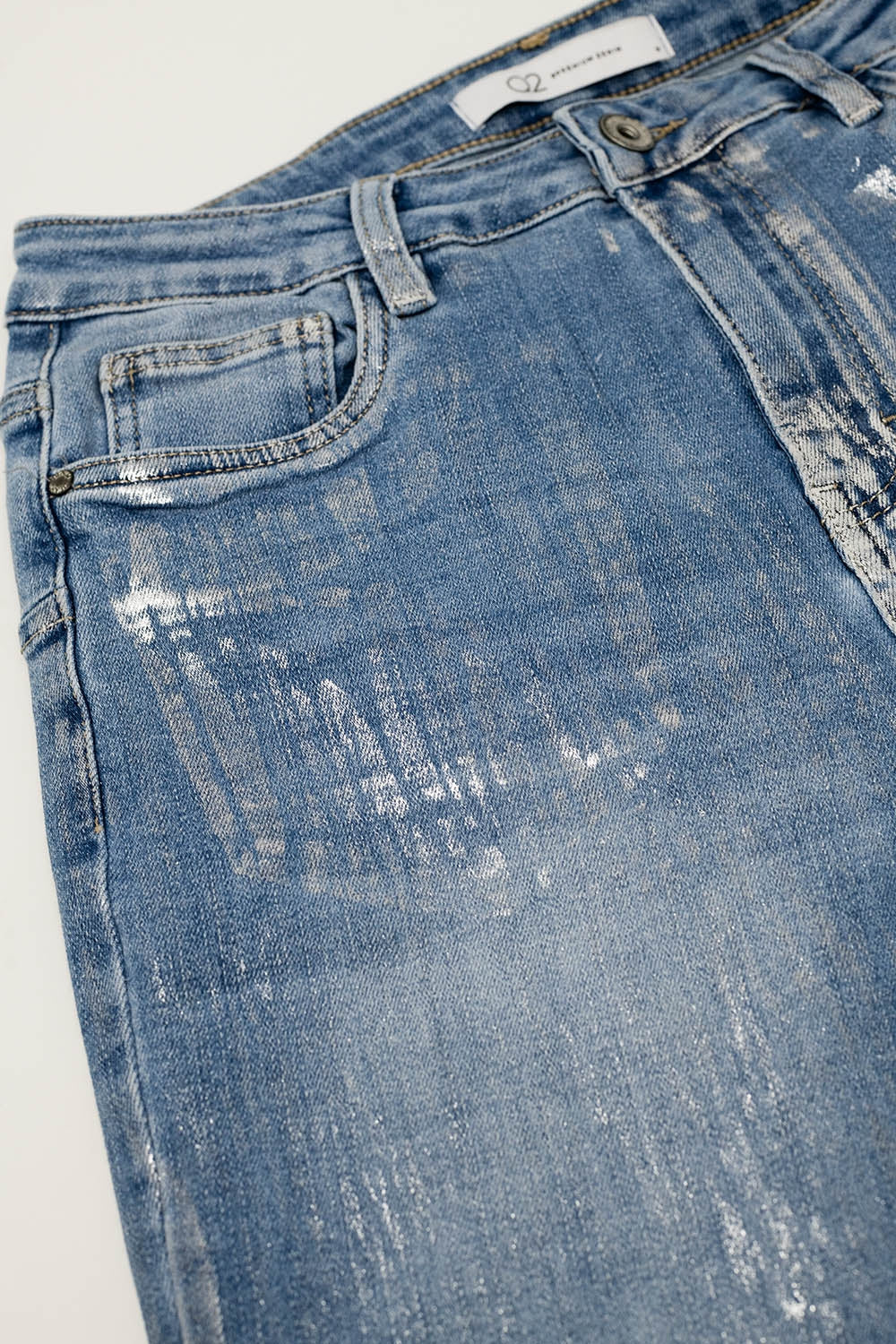 Jean super skinny en denim avec effet métallique