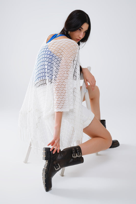 Cardigan ouvert blanc avec extrémités à franges et manches 3/4