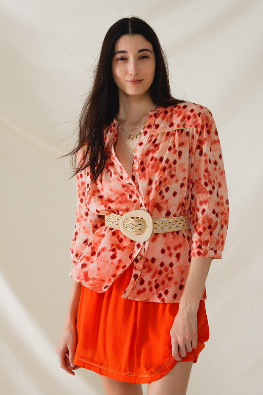Chemise orange à imprimé abstrait et manches 3/4
