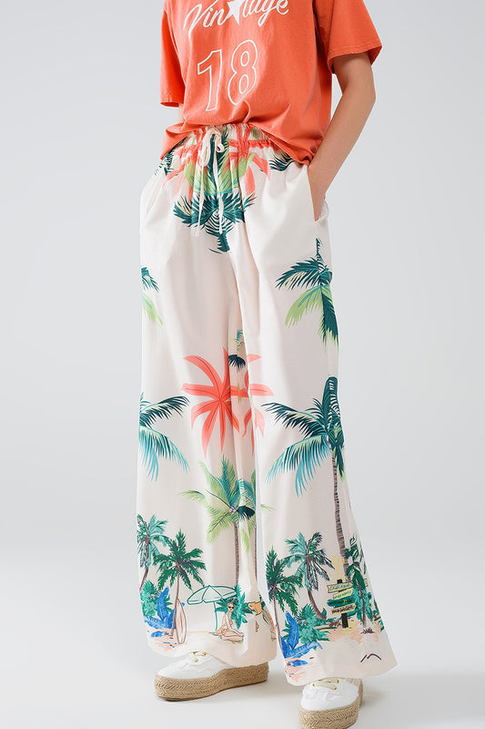 Pantalon droit crème avec imprimé plage et taille élastique