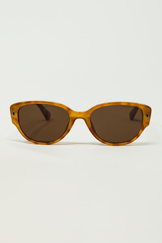 Lunettes de soleil ovales en écaille de tortue jaune clair
