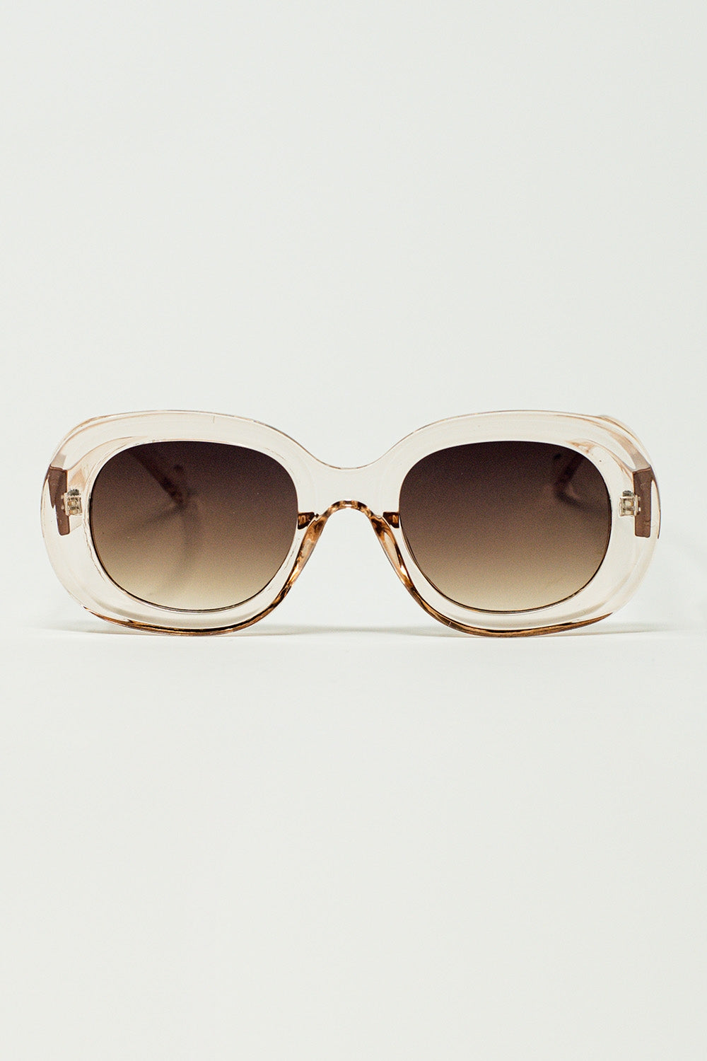 Lunettes de soleil circulaires surdimensionnées en blanc translucide