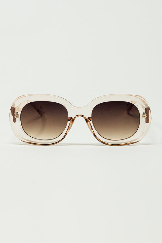 Lunettes de soleil circulaires surdimensionnées en blanc translucide