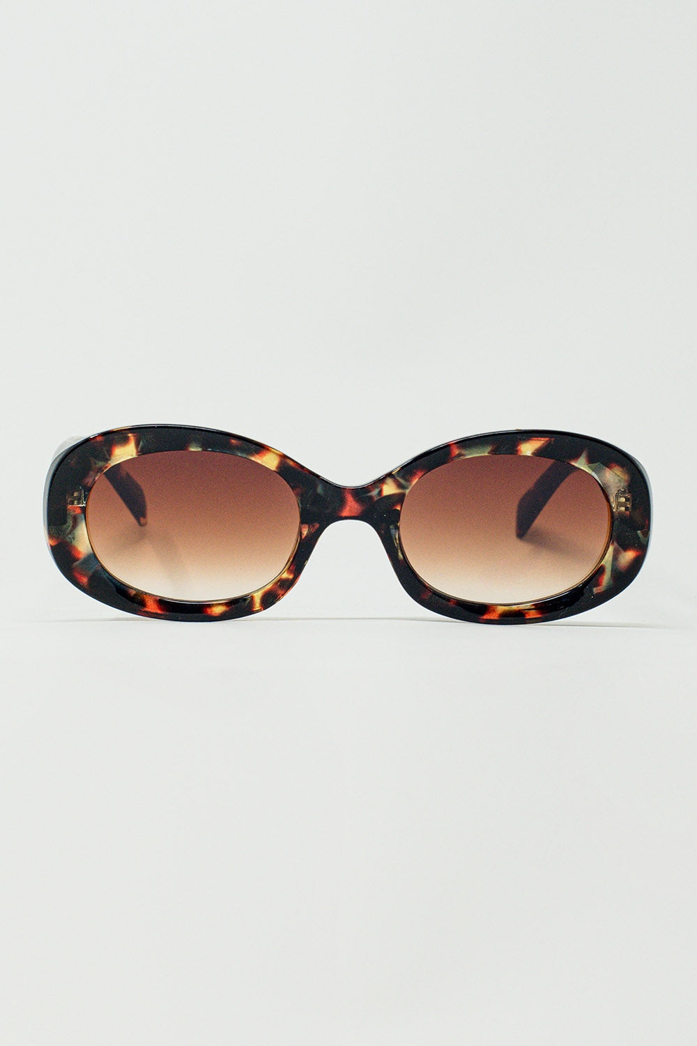 Lunettes de soleil de forme ovale en écaille de tortue