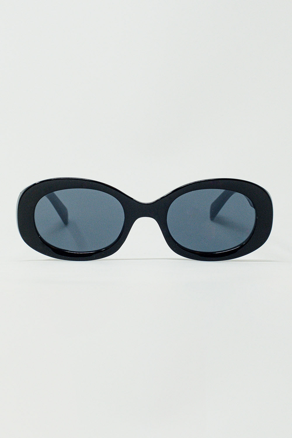Lunettes de soleil ovales surdimensionnées en noir