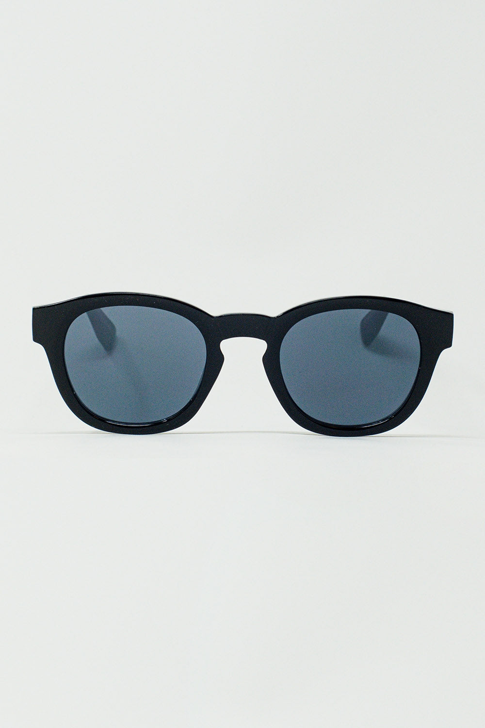 Lunettes de soleil rondes des années 90 avec verres teintés noirs et monture noire