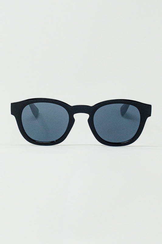 Lunettes de soleil rondes des années 90 avec verres teintés noirs et monture noire