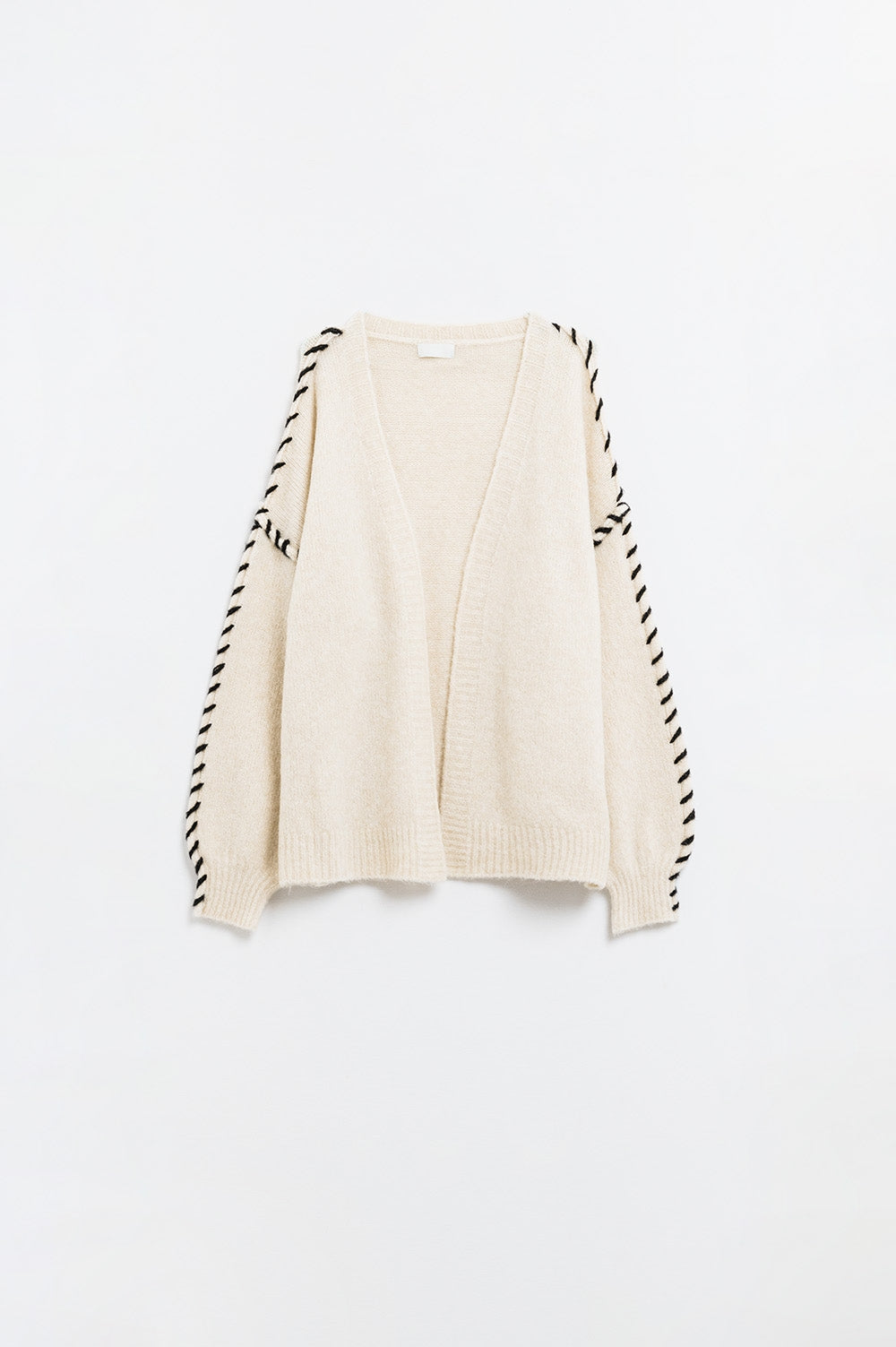 Cardigan ouvert crème avec bordure noire en maille épaisse