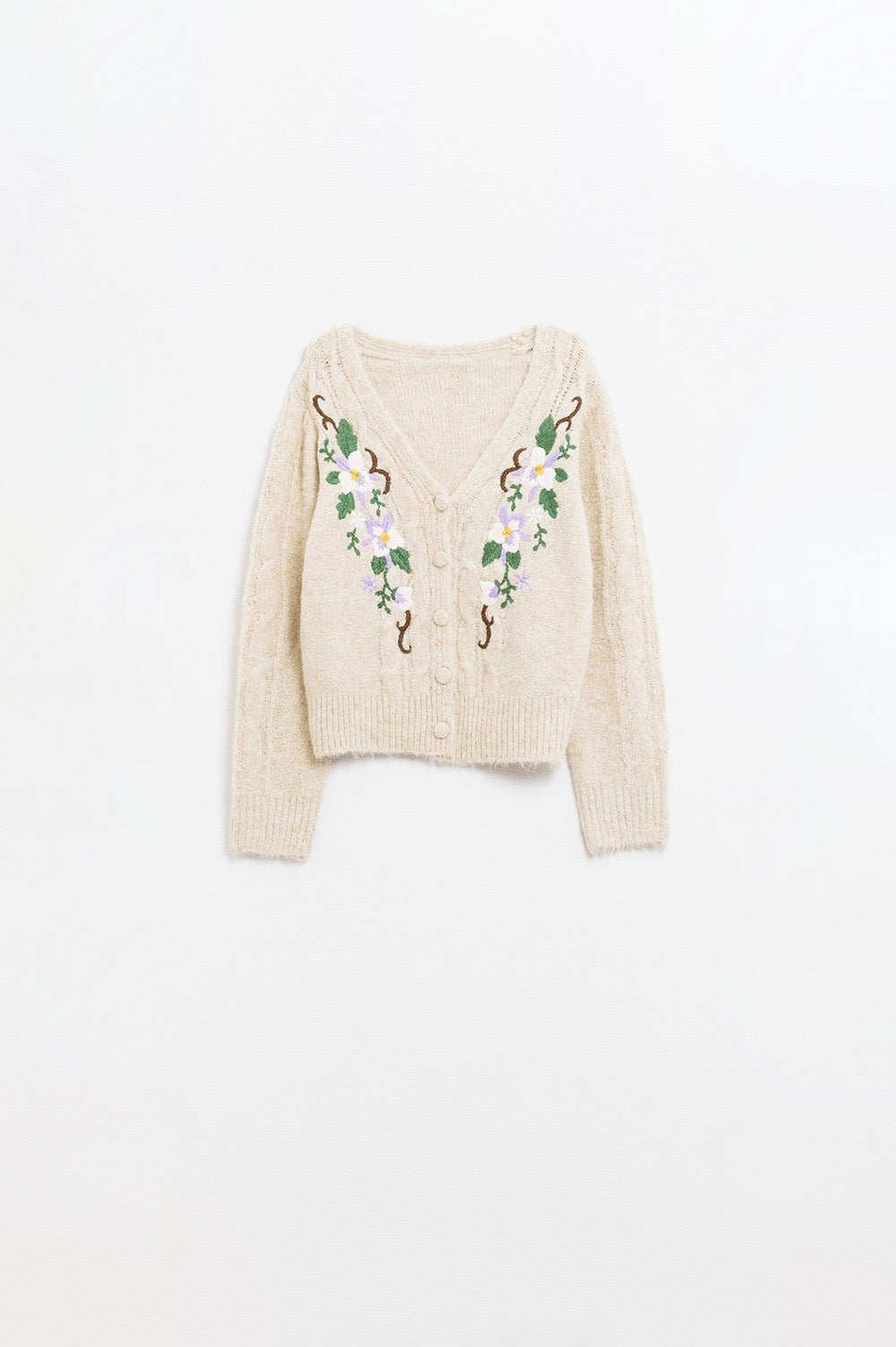 Cardigan beige en maille torsadée avec fleurs brodées