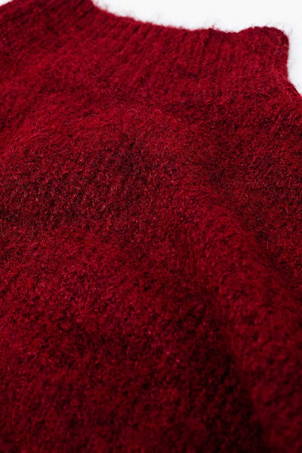 Pull-over rouge duveteux à col montant et manches ballon