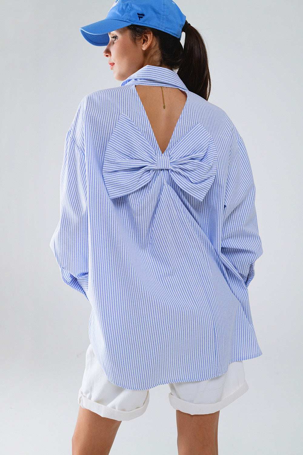 Chemise oversize en popeline rayée avec nœud en bleu et blanc