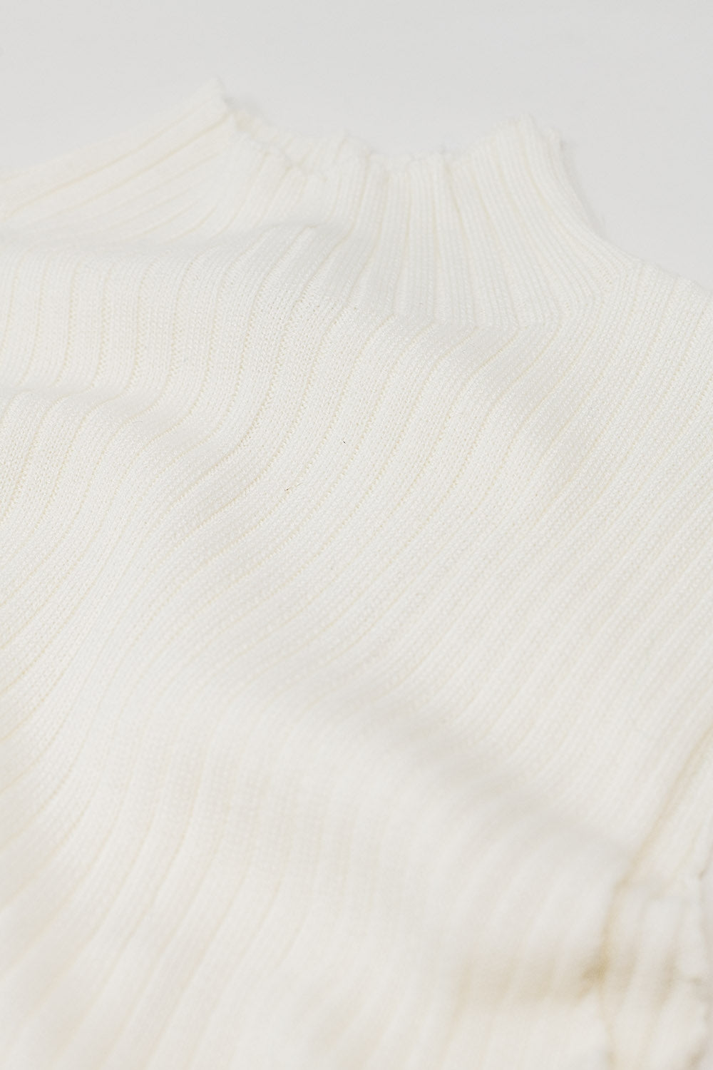 Pull en laine sans manche à maille fine écru