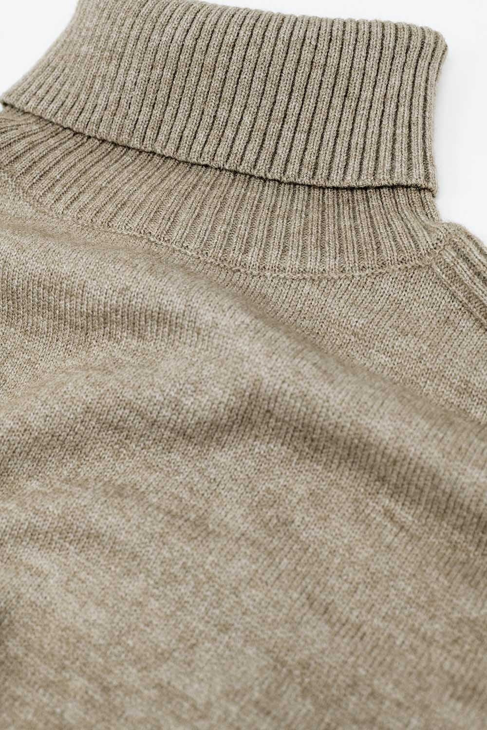 pull large beige avec manches côtelées