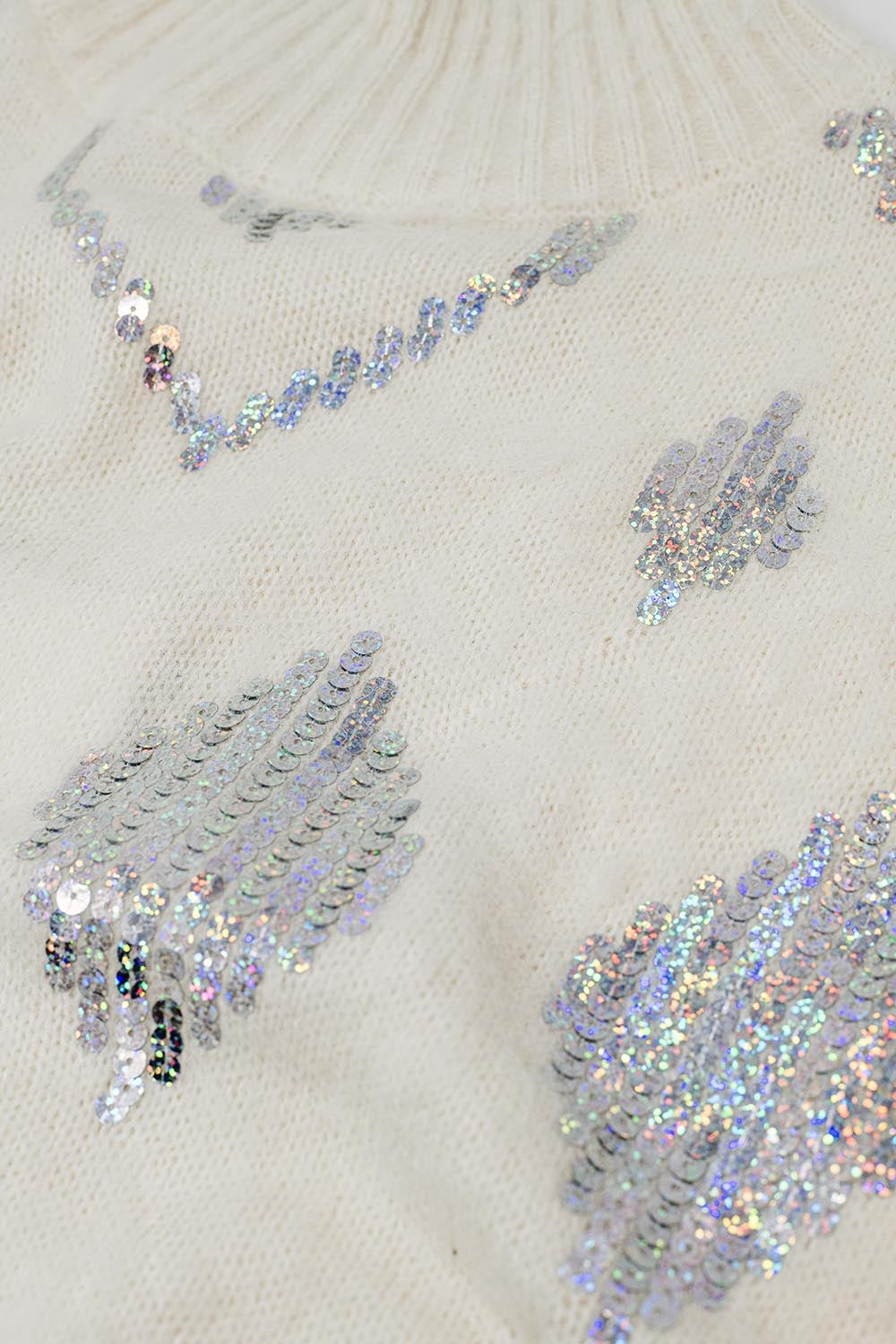Pull à manches courtes crème avec ornements en paillettes