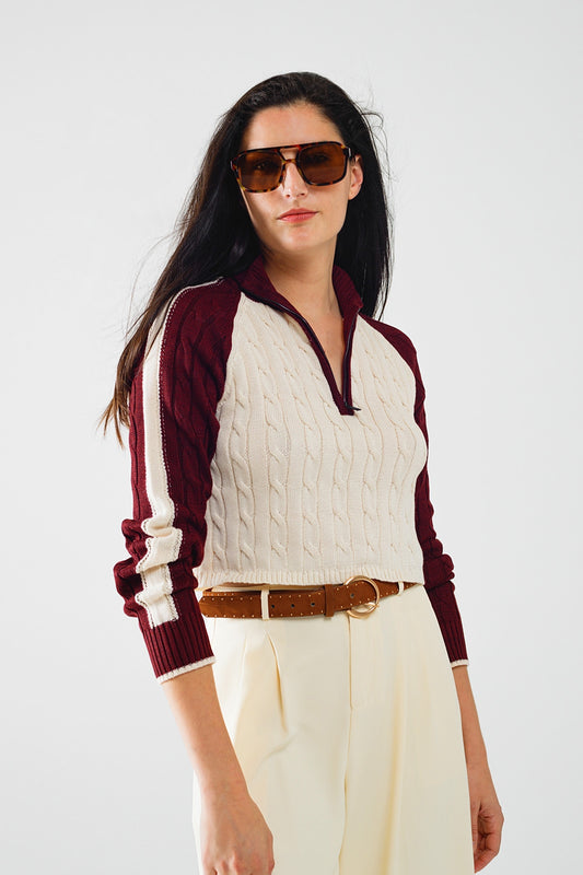 pull cropped blanc et bordeaux avec fermeture éclair au niveau du cou