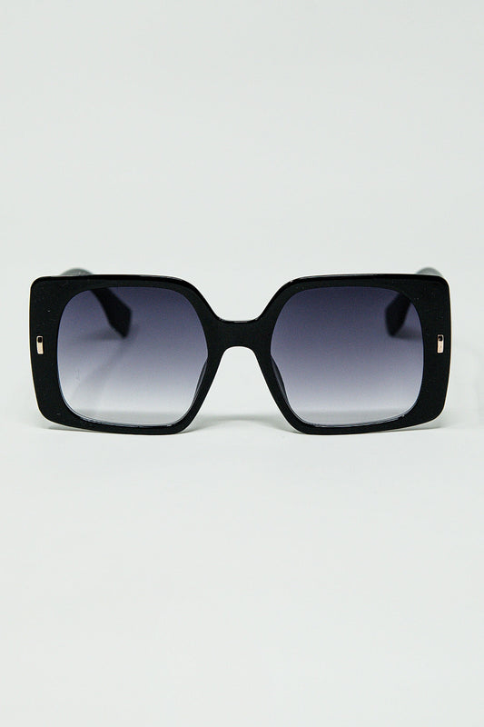 Black square sunglasses with gold detail on the side