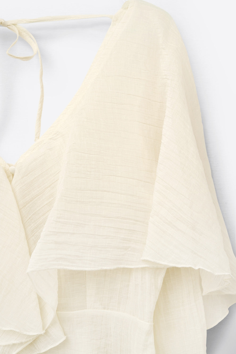 blouse courte en mousseline de soie fluide à manches longues