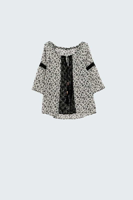 Q2 blouse en mousseline de soie imprimée de fleurs avec détails en dentelle