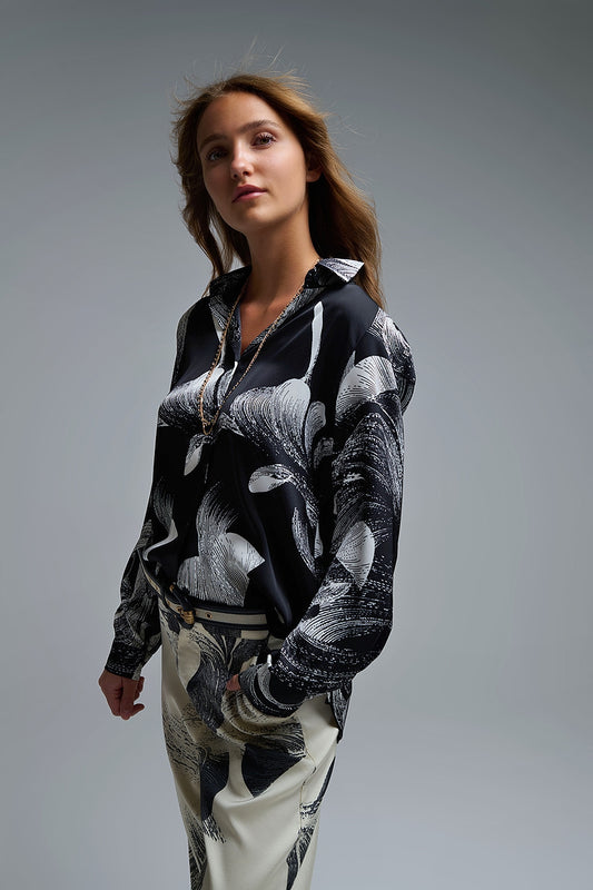 Q2 Blouse en satin noir à imprimé abstrait