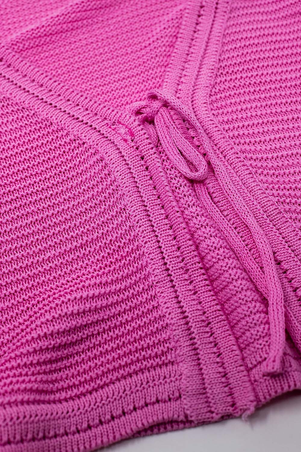 Cardigan à manches longues en tricot fuchsia avec détails de nœuds