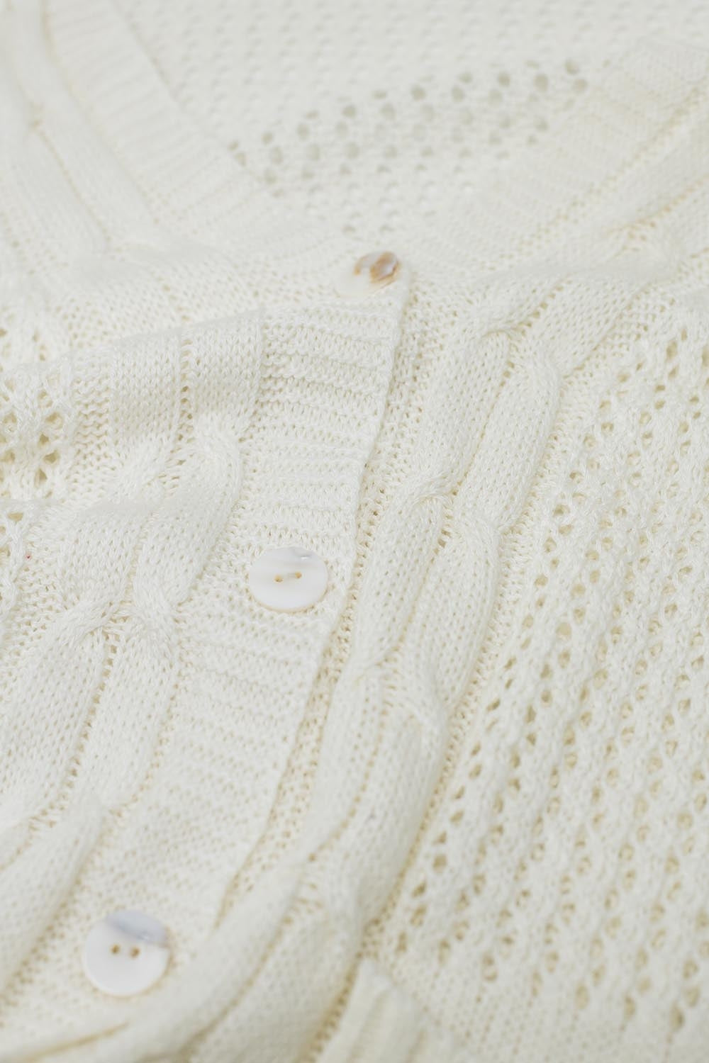 Cardigan blanc au crochet avec poches et boutons