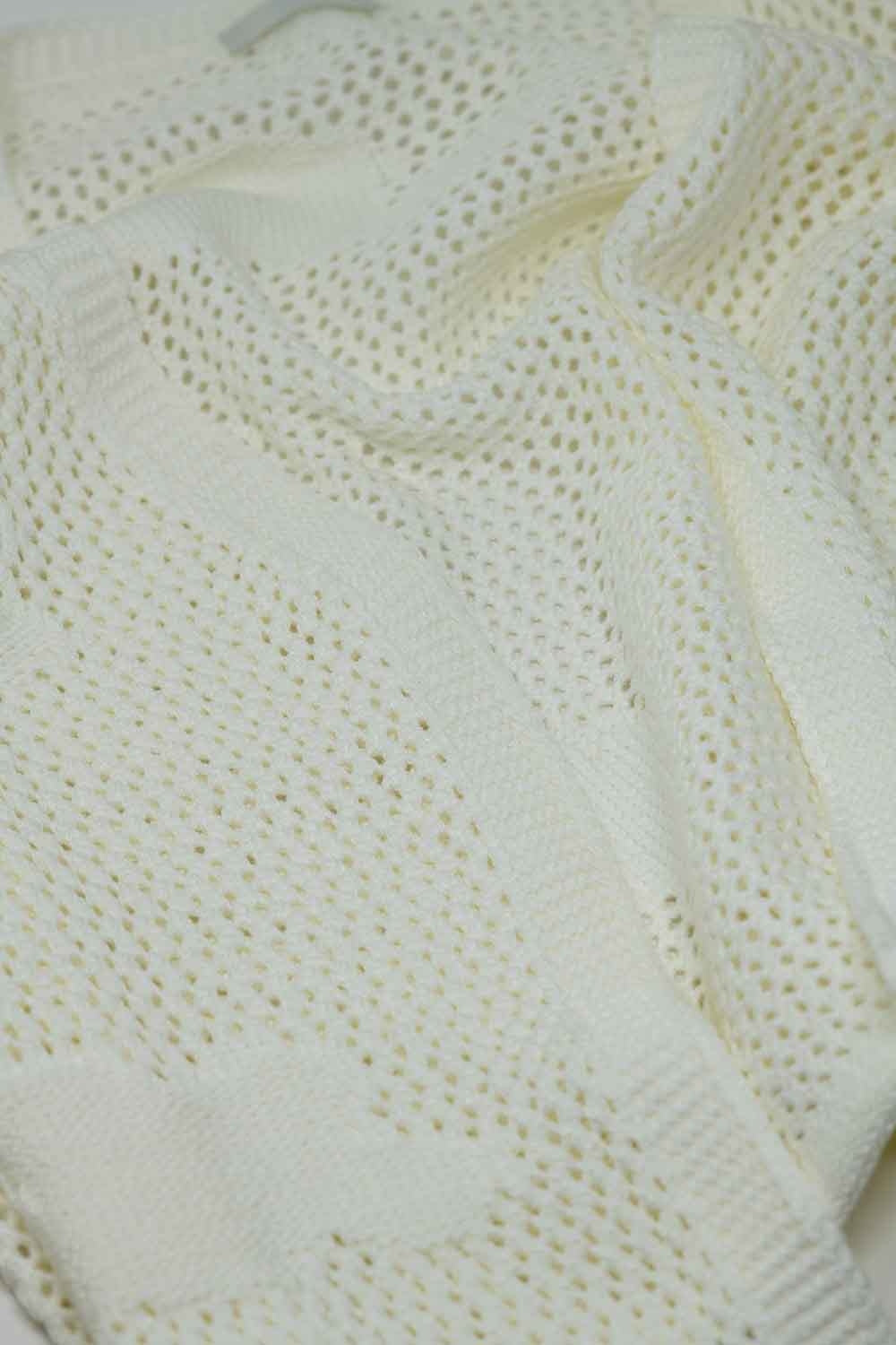 Cardigan en crochet avec nuages en tricot en blanc