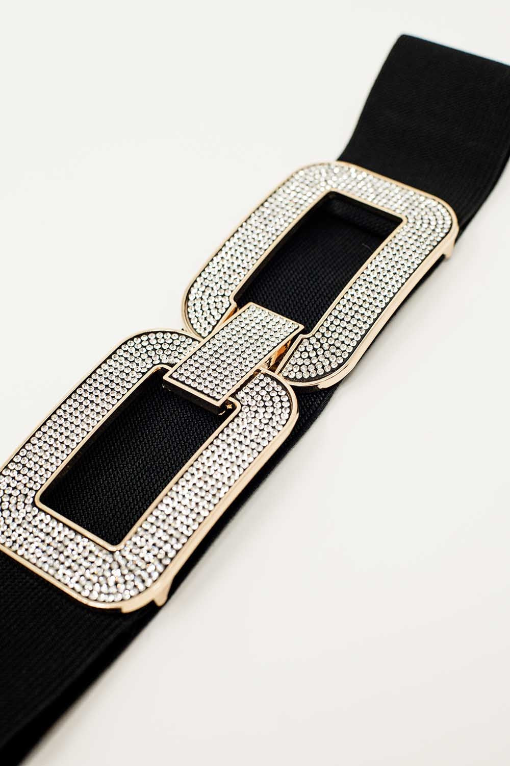 Ceinture élastique noire avec boucle ovale double avec incrustations de strass