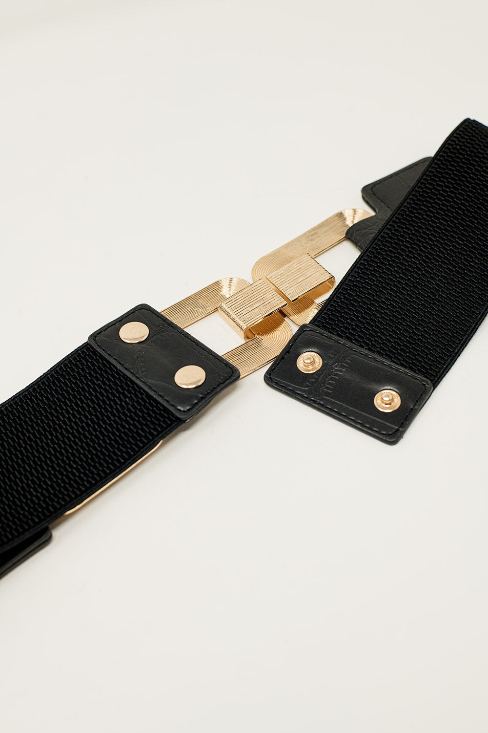 ceinture élastique noire avec triple boucle en métal