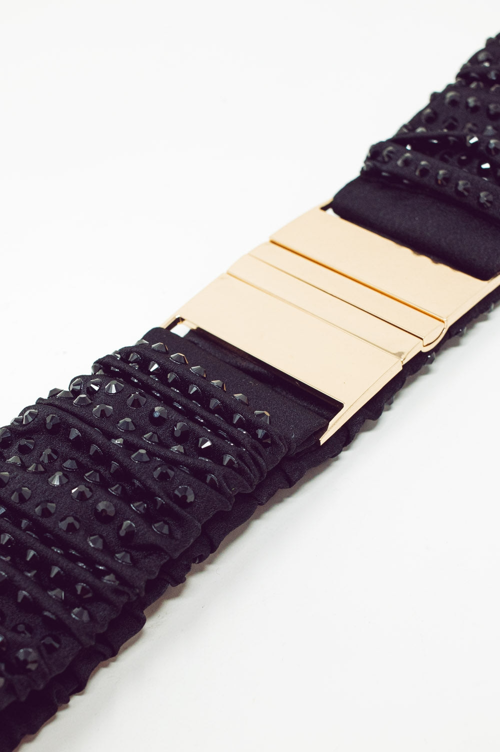 Ceinture élastique perlée avec boucle dorée en noir